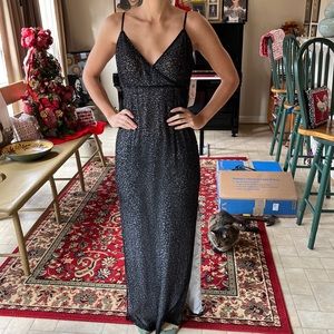 Black beaded evening gown with mid side slit